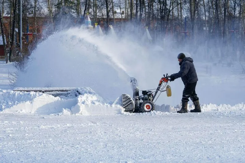 A man shovels snow